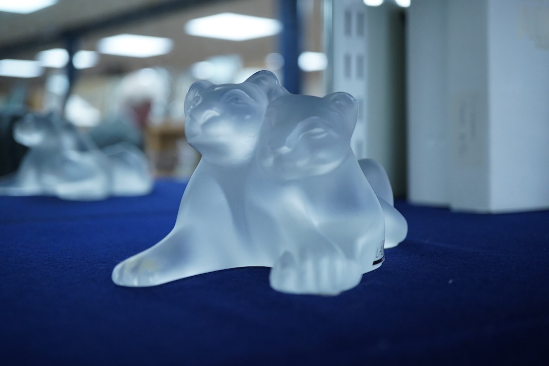 A Lalique ‘ Tambwee’ model of two lion cubs (boxed), 12cm wide